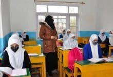 A private school teacher in Kashmir taking his class